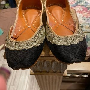 Black and gold shoes
